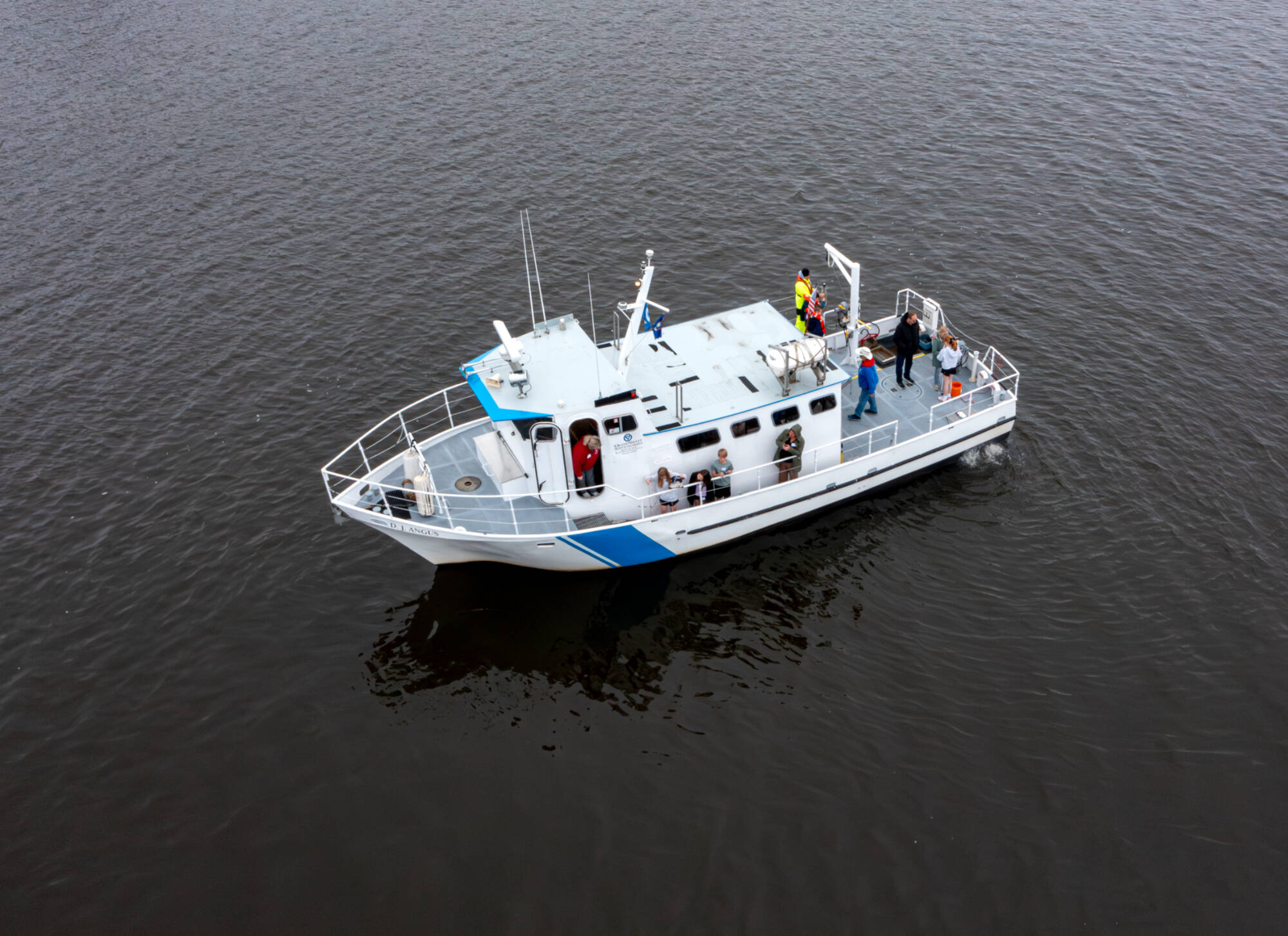 Students from Hilda Durán's Zeeland Christian 5th grade class take an educational trip aboard the D. J. Angus in Spring Lake on April 13. The AWRI's 45-foot vessel serves researchers and educational groups out of Harbor Island in Grand Haven. (Photo r...
